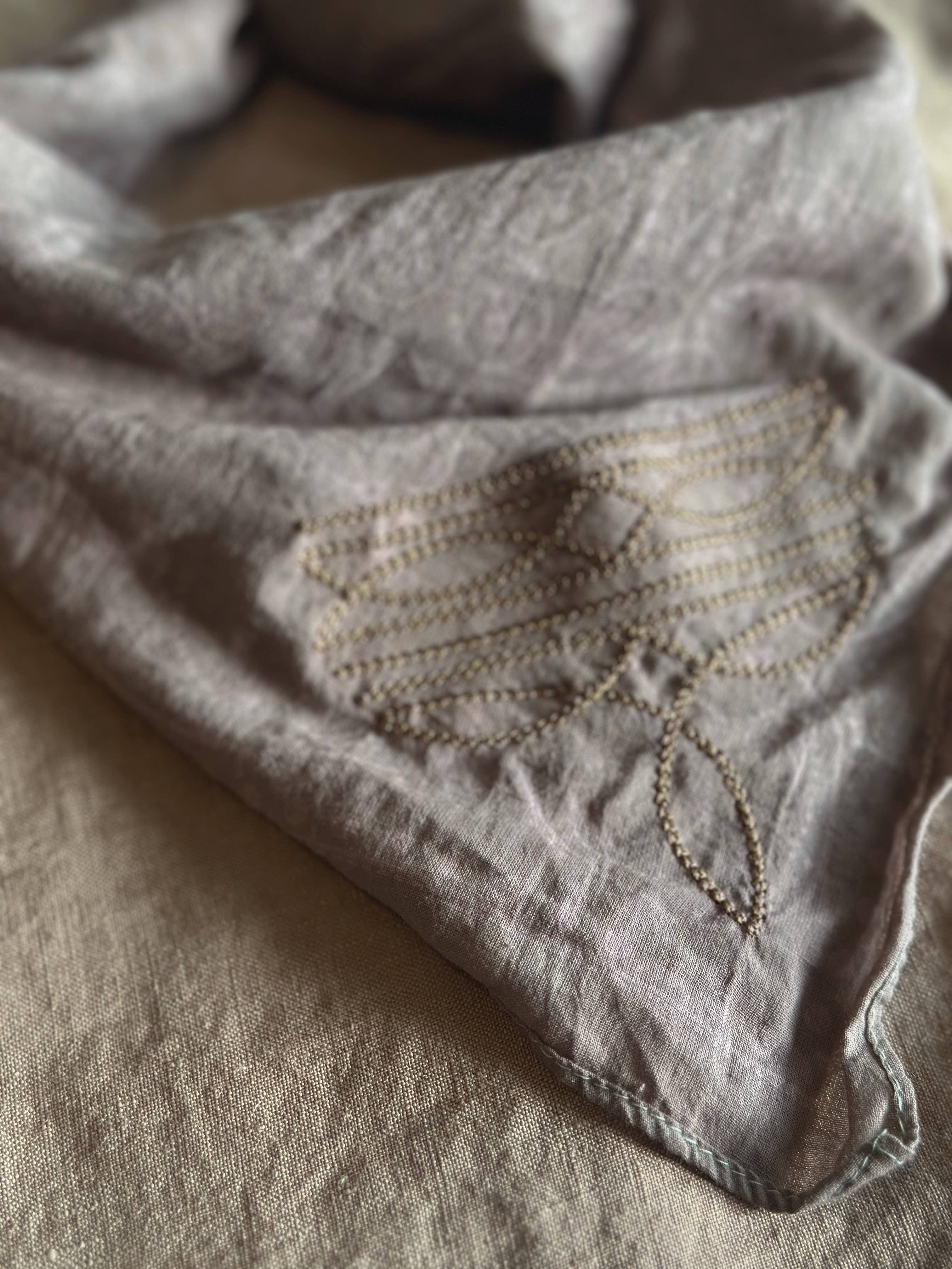 Brown bandana with embroidered boot stitching design