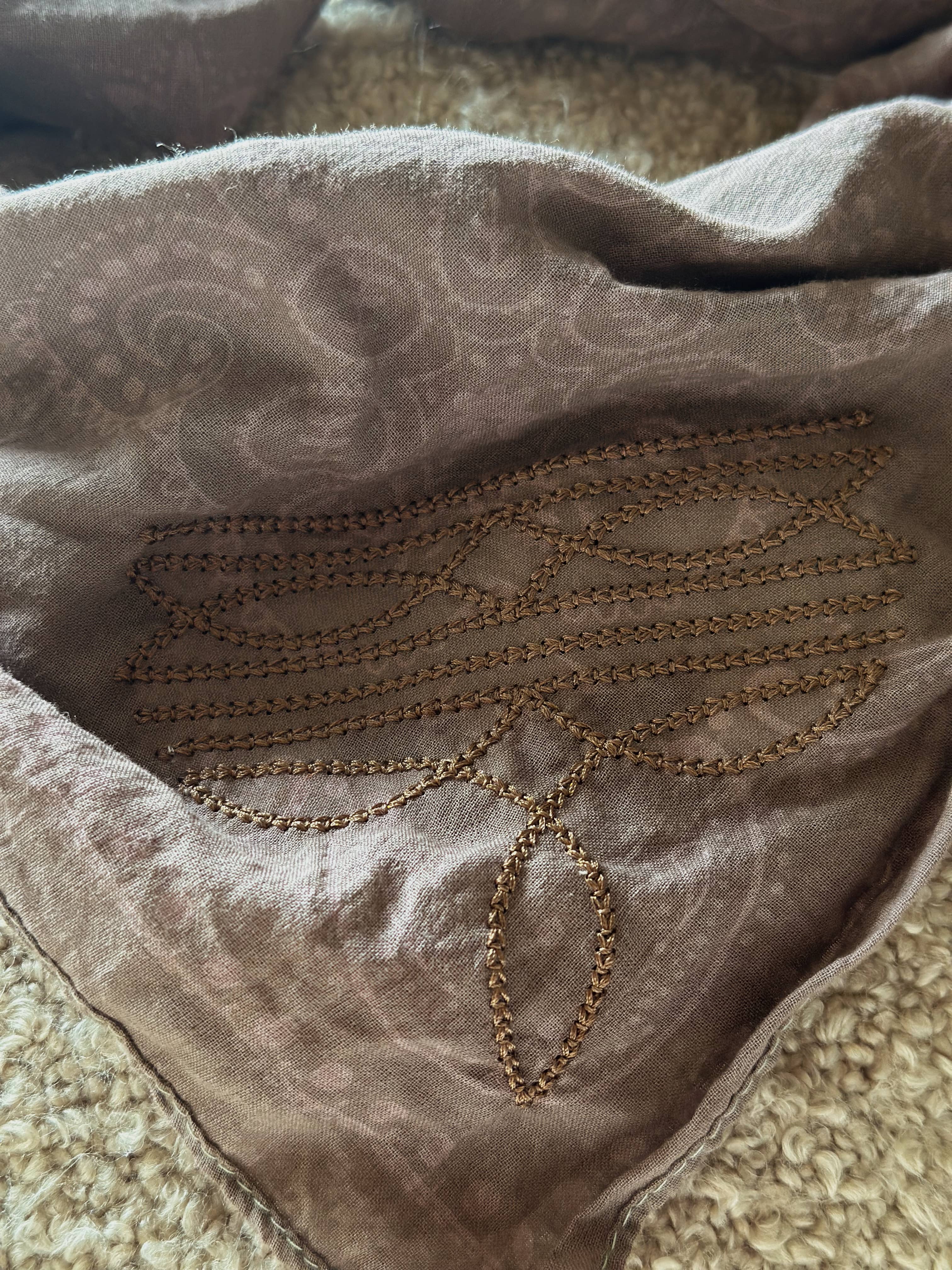 Brown bandana with embroidered boot stitching design