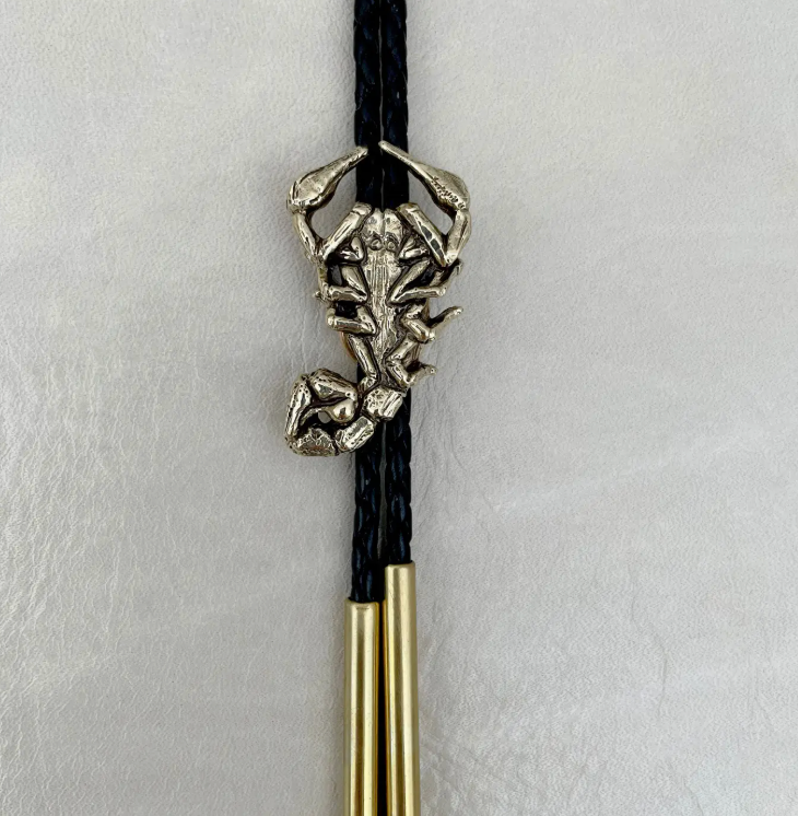 HELIOTROPE- Scorpion Bolo- Black/ Brass 42"