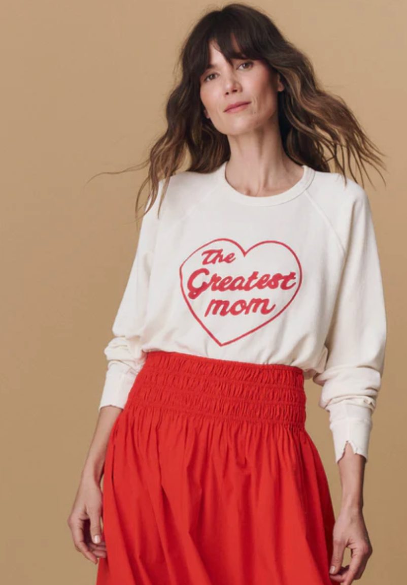 The Great. The College Sweatshirt. in Washed White with Greatest Mom Graphic